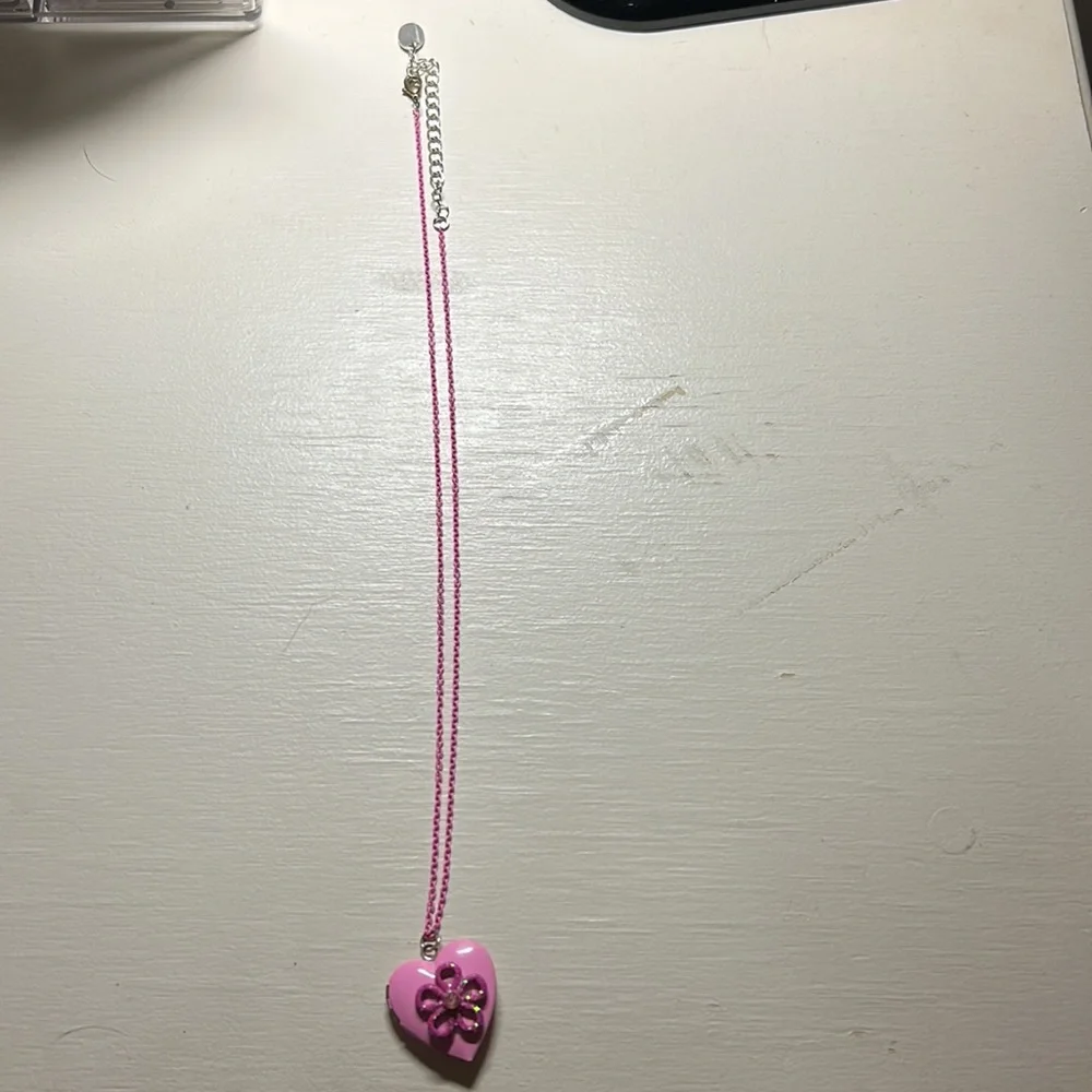 Kids 16” pink chained necklace with pink flower locket that opens. Gently used